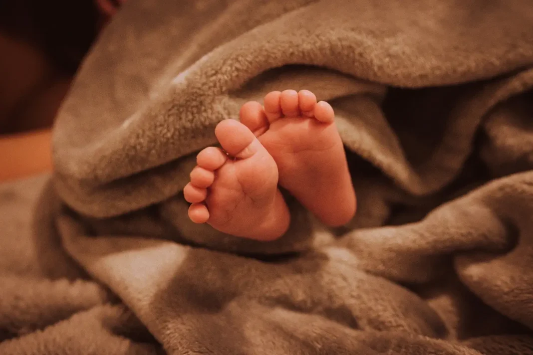 baby sleeping in a blanket